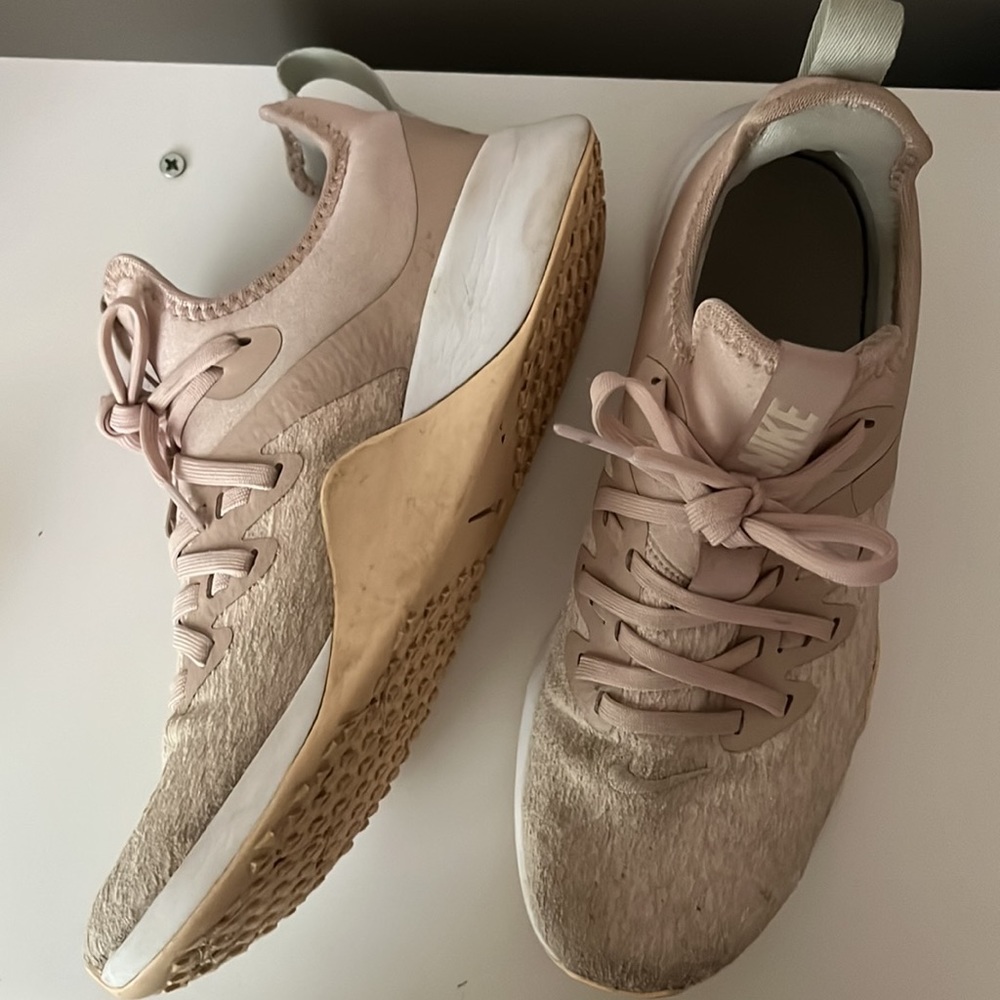 Light pink Nike tennis shoes